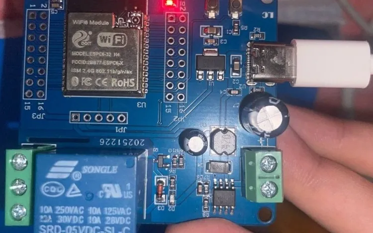 ESP32-C6 microcontroller board with Songle relay and active status LED